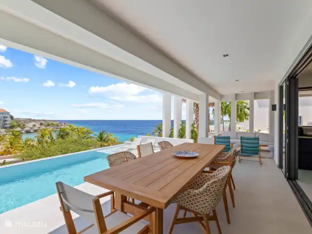 Station balnéaire de Blue Bay | Villa Bocazul 1 | Curaçao, Curaçao-Centre, Blue Bay - villa Dîner en plein air à cette table