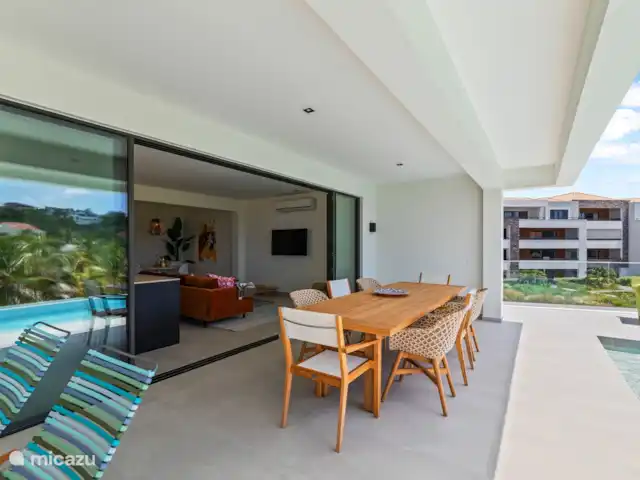 Station balnéaire de Blue Bay | Villa Bocazul 1 | Curaçao, Curaçao-Centre, Blue Bay - villa Dîner en plein air à cette table