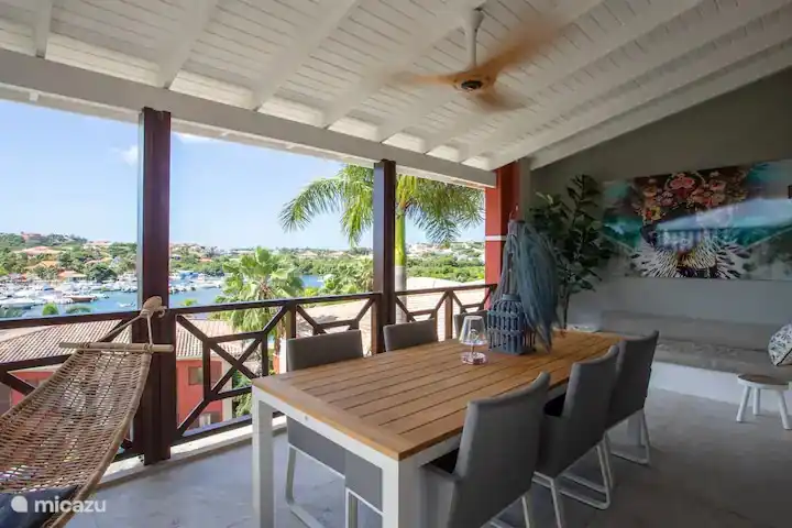 Large terrace with hammock and lounge bed.
