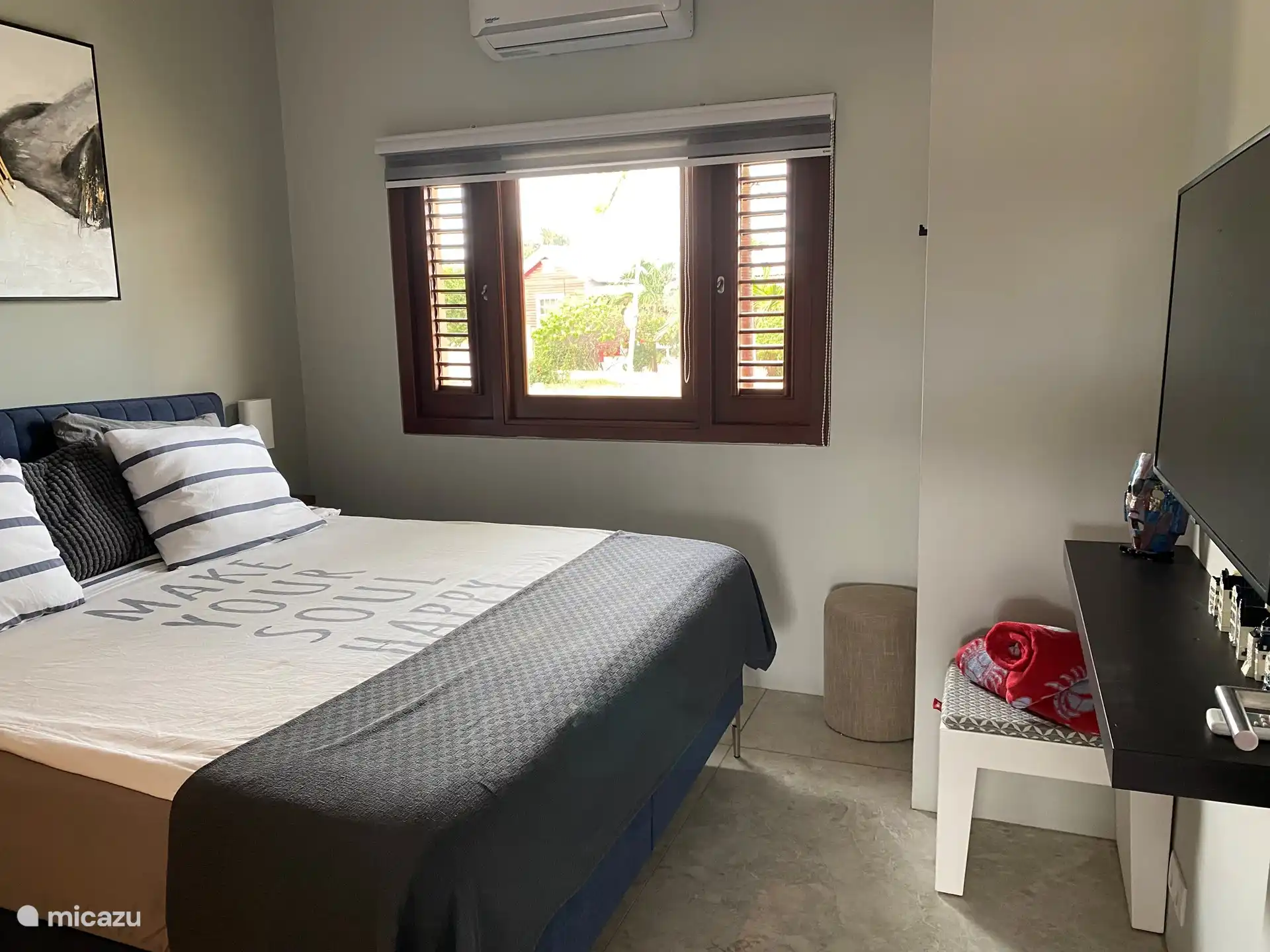 2nd large bedroom with large double bed and adjoining bathroom.