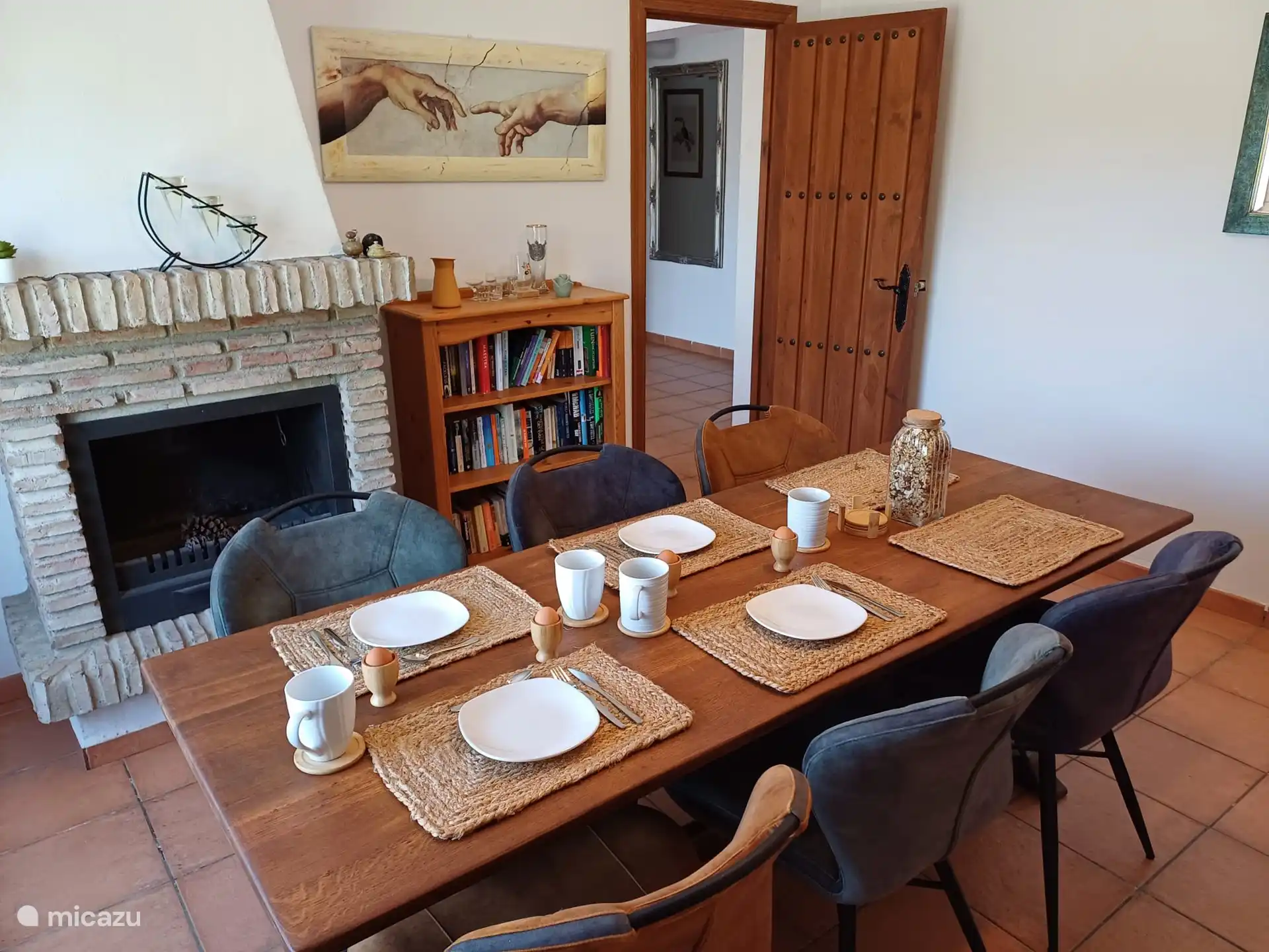 Cozy dining area and mini-library