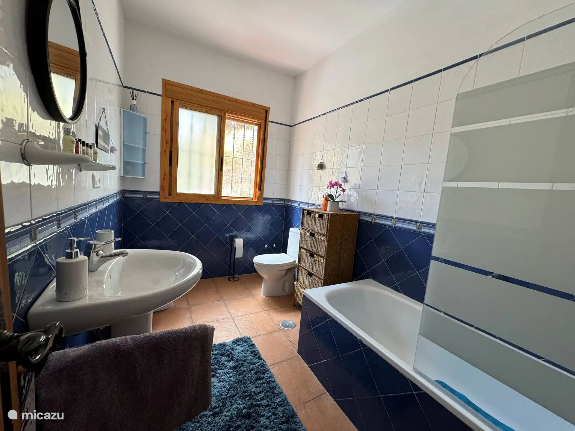 
Spacious bathroom with bath, shower, sink, toilet and bidet