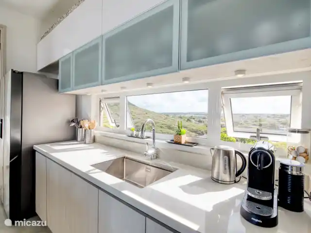 Location de Vacances Curaçao, Curaçao-Centre, Willemstad, appartement - Magna Vista : climatisation complète, piscine, salle de sport Cuisine entièrement équipée avec tout le confort moderne