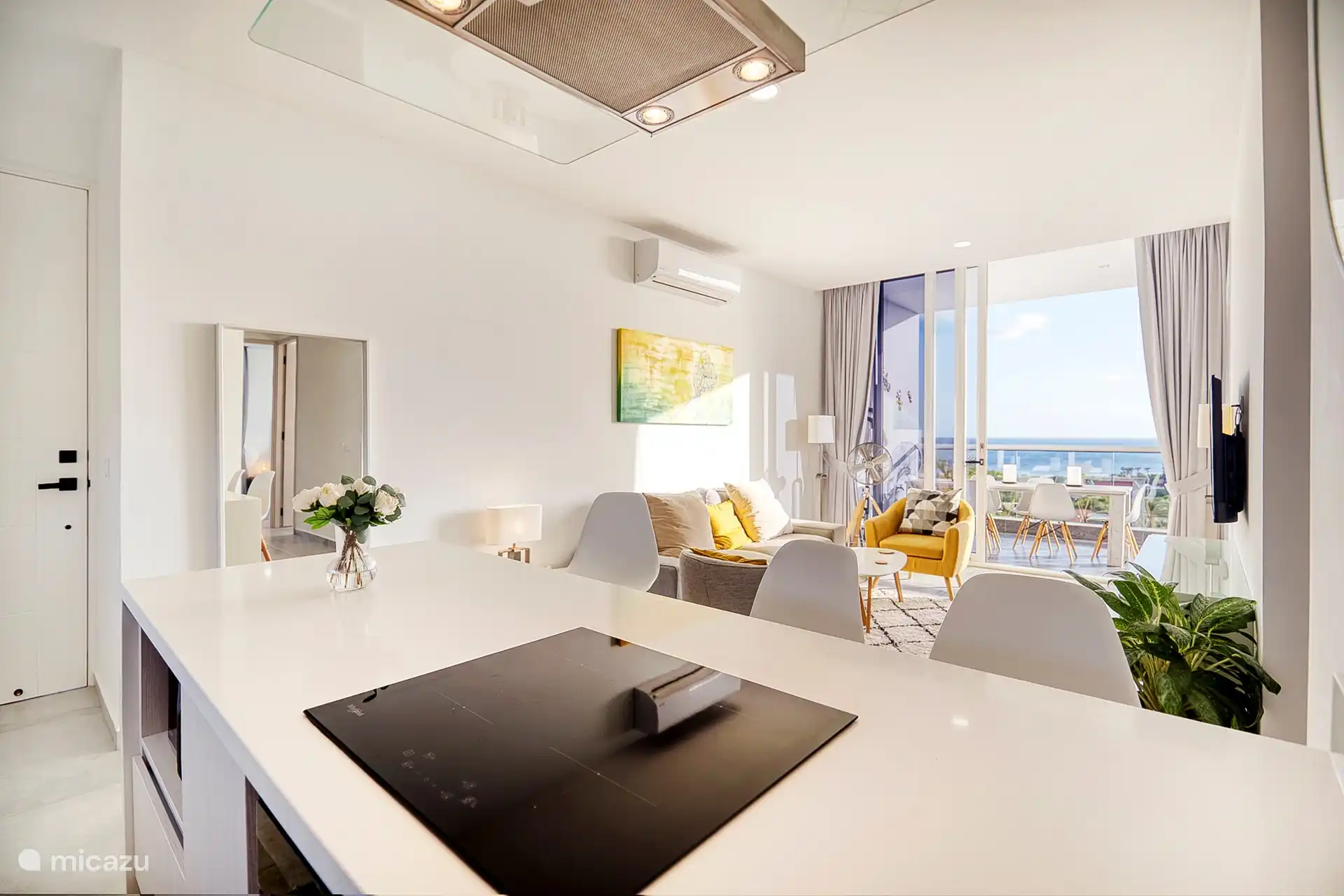 Open kitchen and living room with ocean views