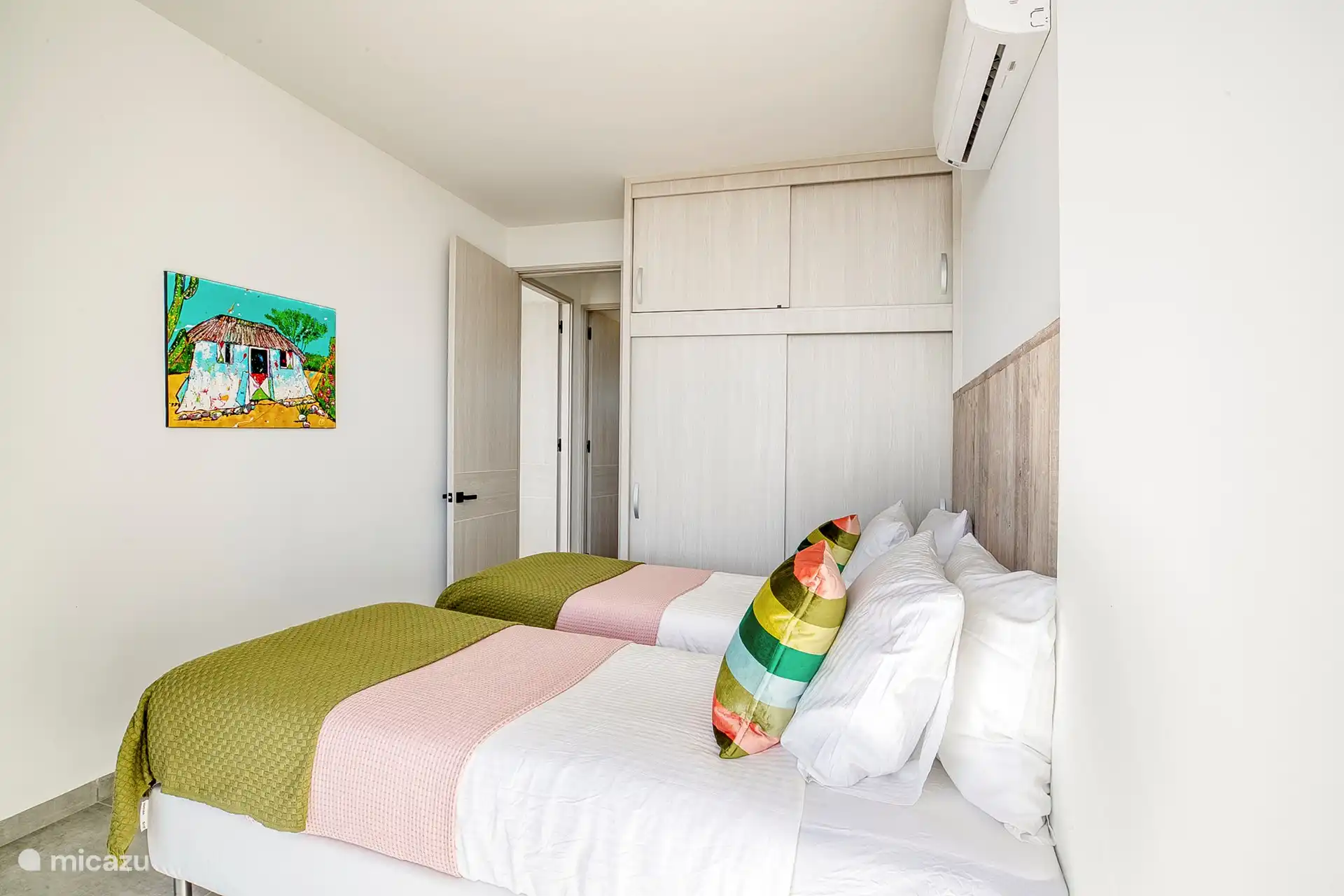 Second bedroom. The twin beds can you joined to form one queen size box spring bed