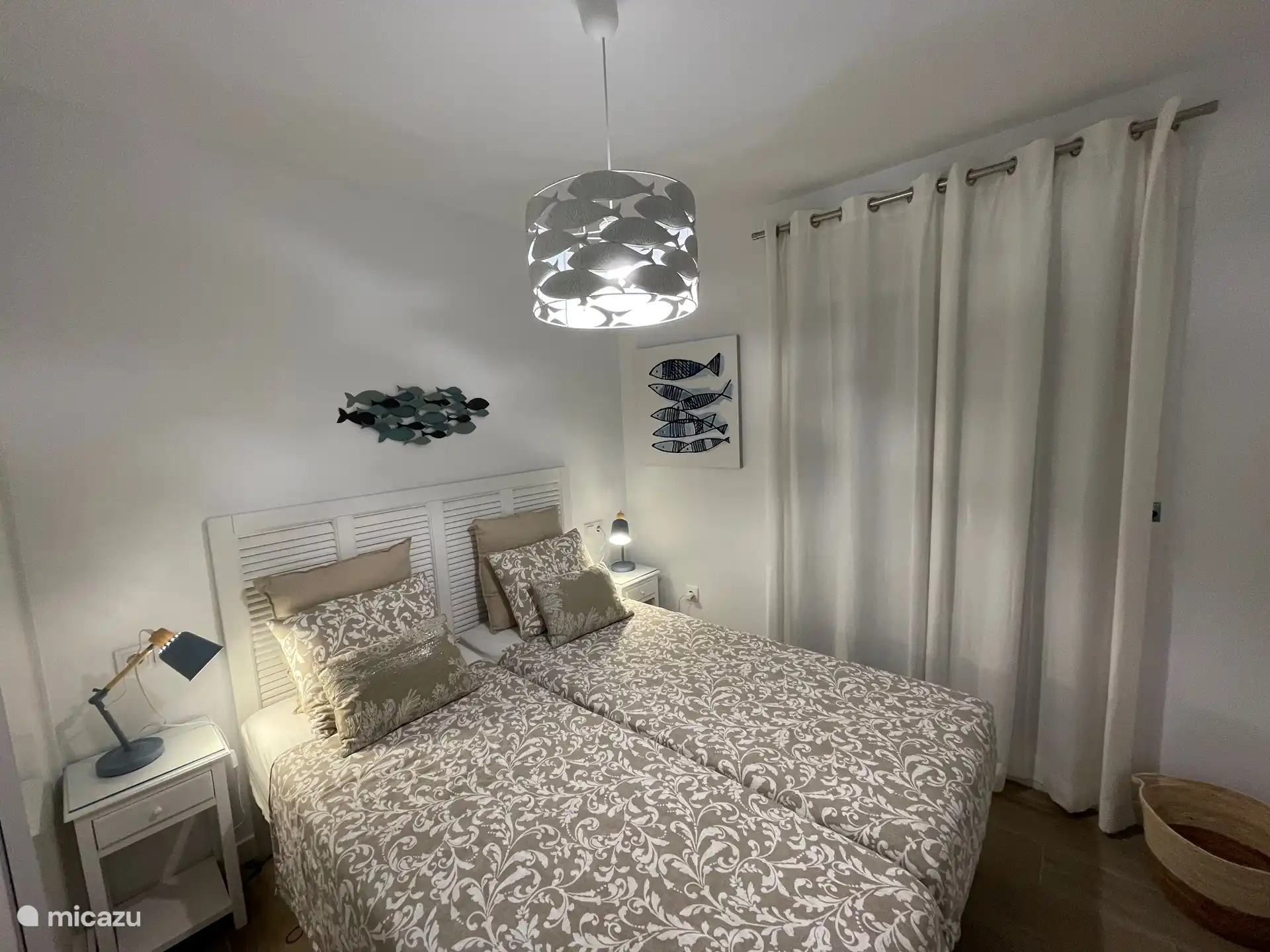 Third bedroom with two beds and built-in wardrobe.