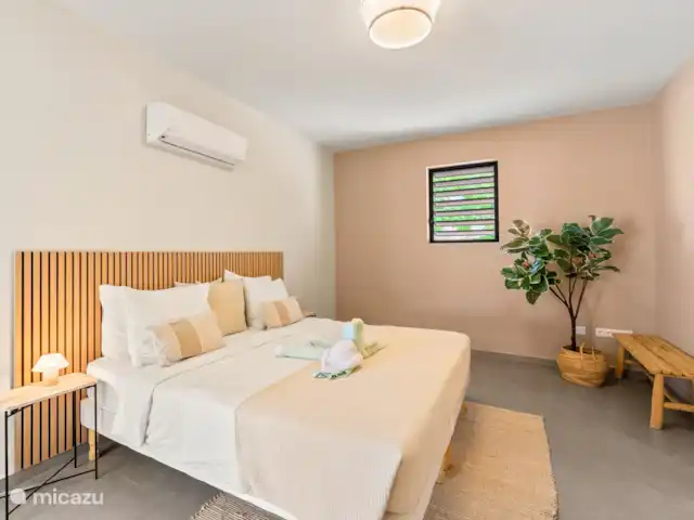 Casa Jan Sofat 57 | Curaçao, Banda Ariba (est), Jan Sofat - appartement Chambre 1 avec lit double, climatisation et salle de bain