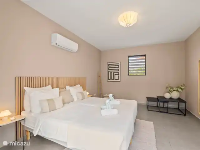 Casa Jan Sofat 57 | Curaçao, Banda Ariba (est), Jan Sofat - appartement Chambre de jardin 2 avec lit double, climatisation et salle de bain