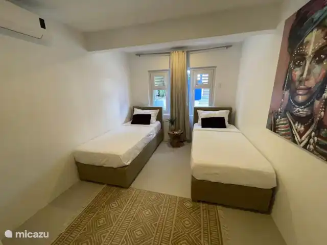Villa Sun & Sand Boutique Resort huren in Curaçao, Curacao-Midden, Willemstad - vakantiehuis Tweepersoonskamer. Mogelijk om van de twee losse bedden een tweepersoonsbed te maken