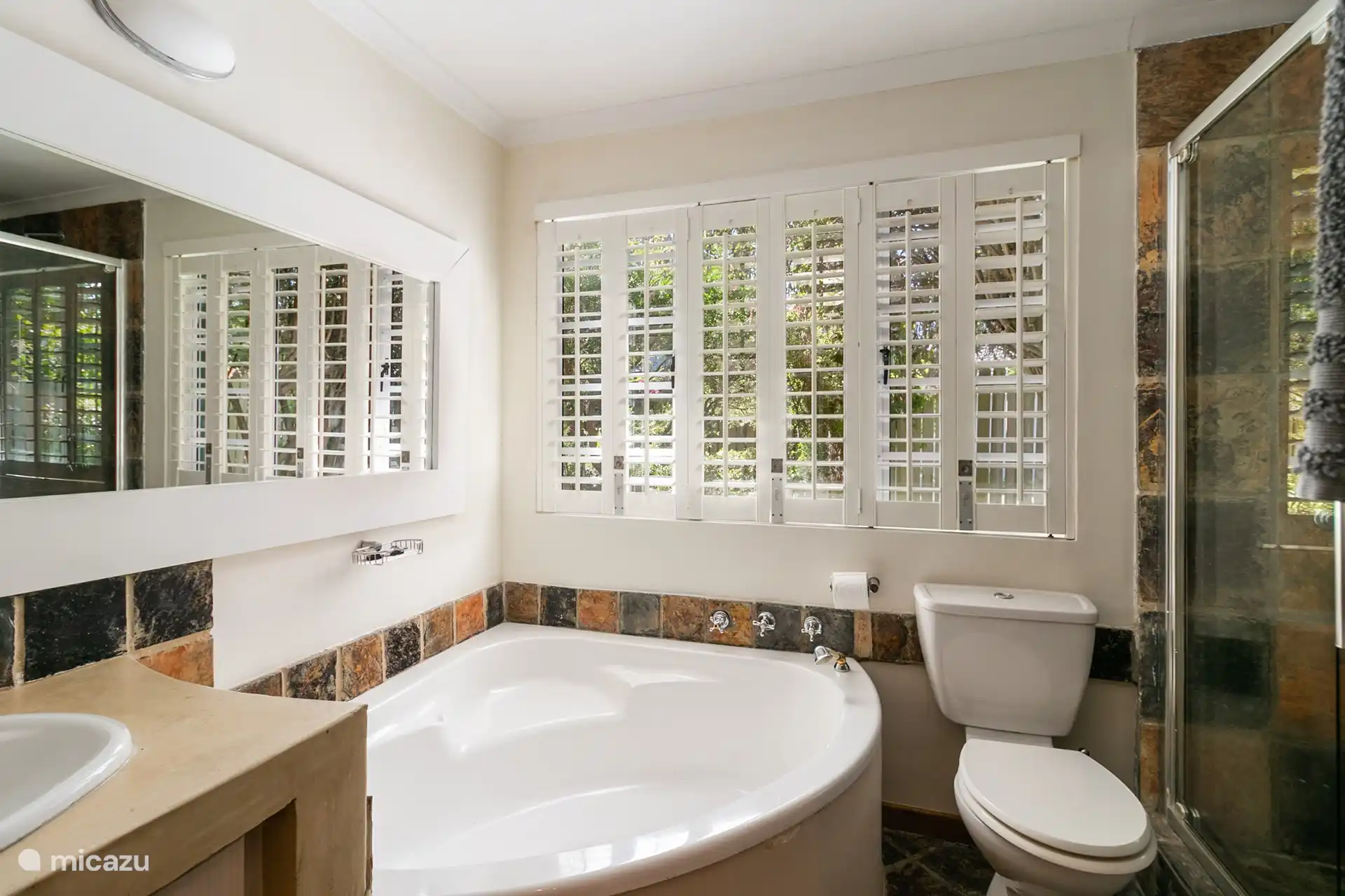 Full ensuite bathroom to the second bedroom, ground floor