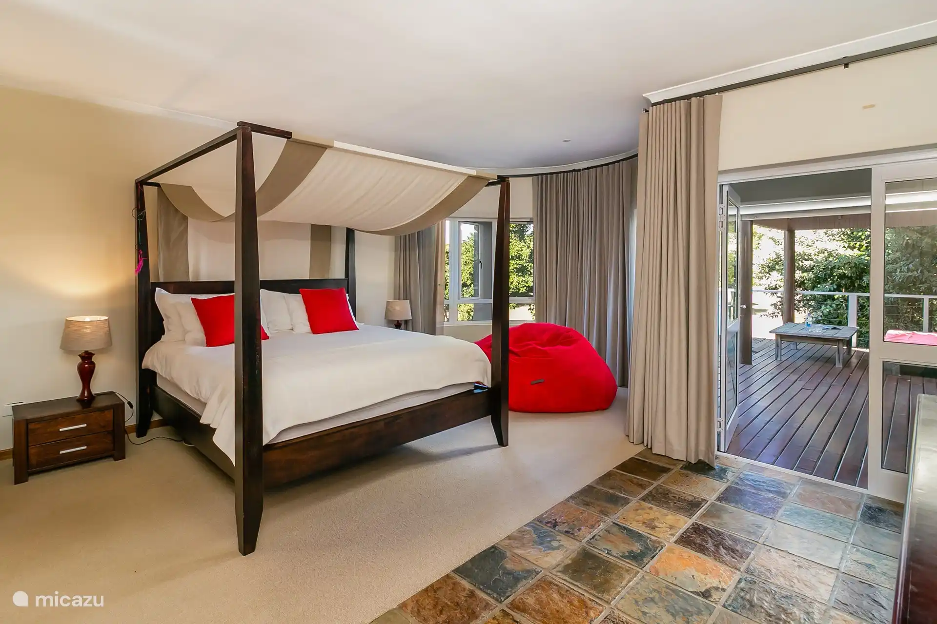 Master bedroom with en suite full bathroom, located on the first floor.