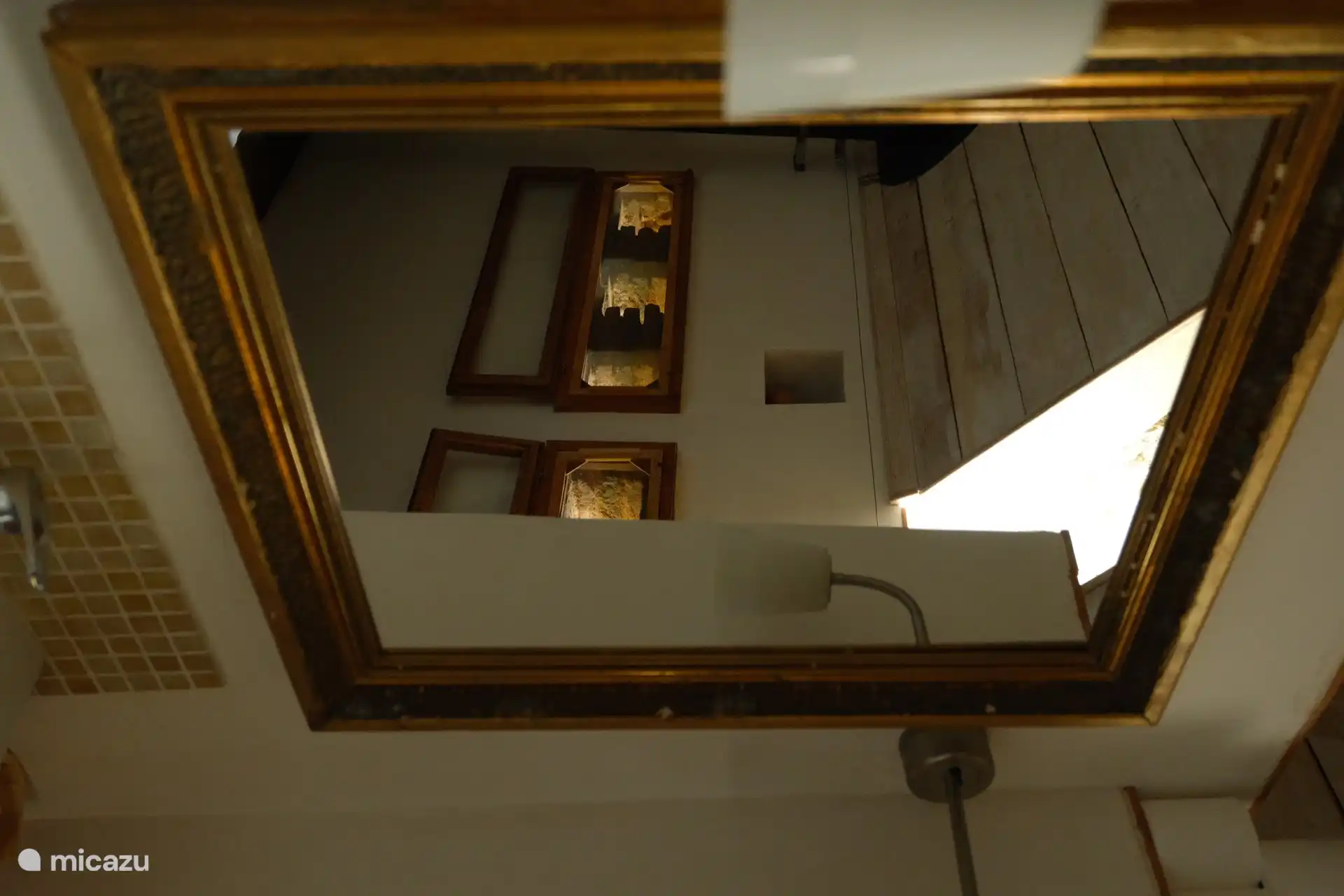 Washbasin with mirror, shower and toilet in the bedroom.