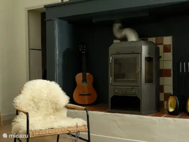 Le Gite de Migou en Francia, Tarn-et-Garonne, Larrazet - casa rural / cabaña El salón comedor con chimenea.