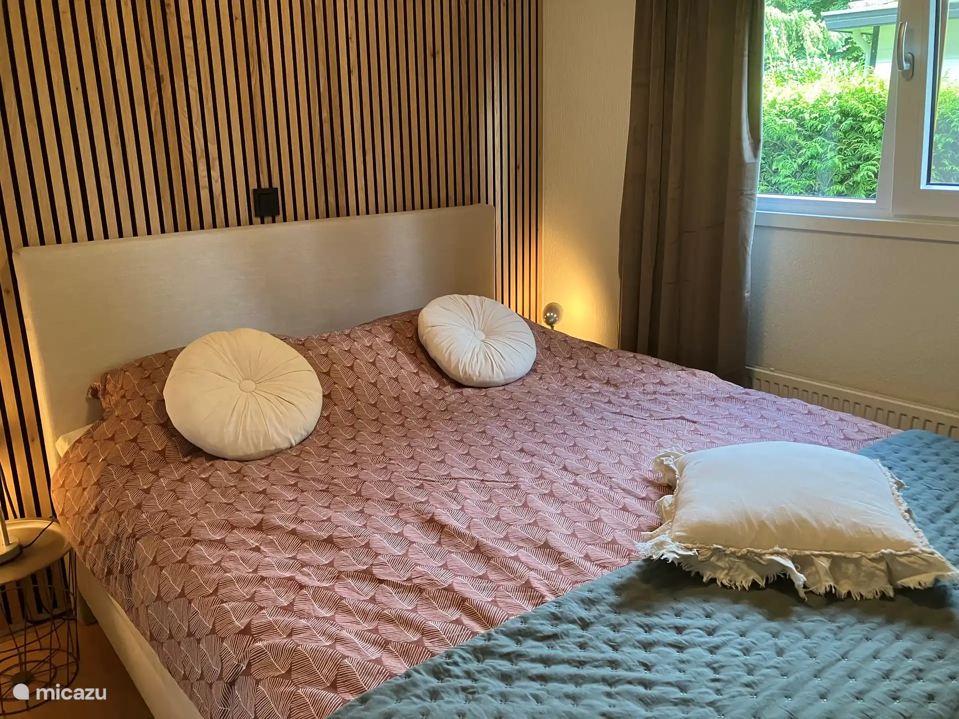 The new box spring in an attractive bedroom. Light switches are made for easy operation. There is a separate connection to charge your phone or tablet next to your bed 