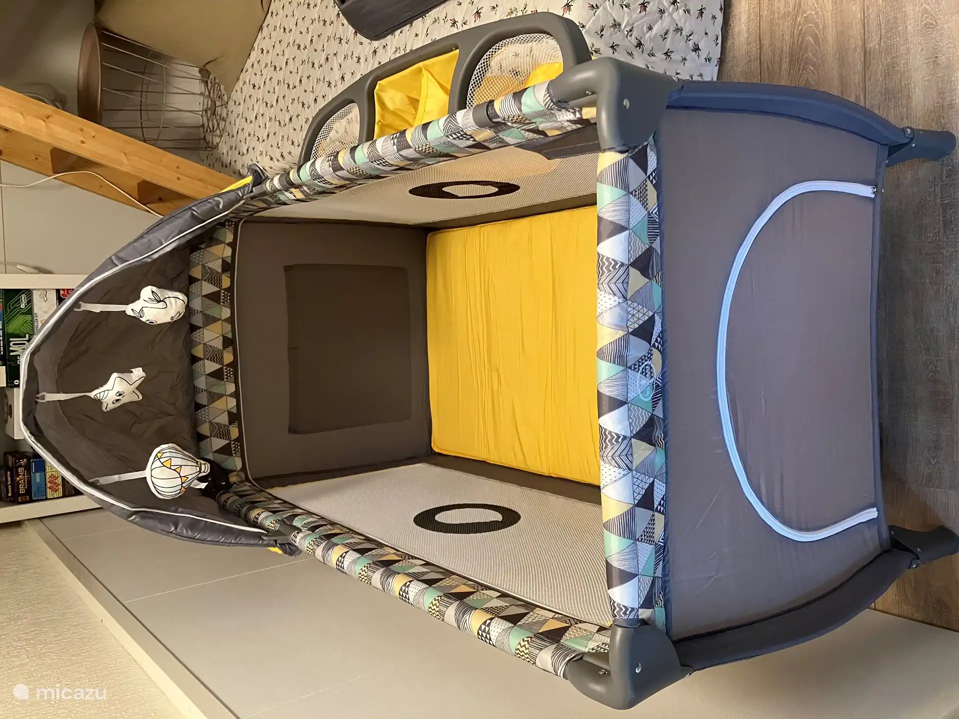 A multifunctional cot with the possibility to raise and a suitable changing table and ikea high chair available for the little one!