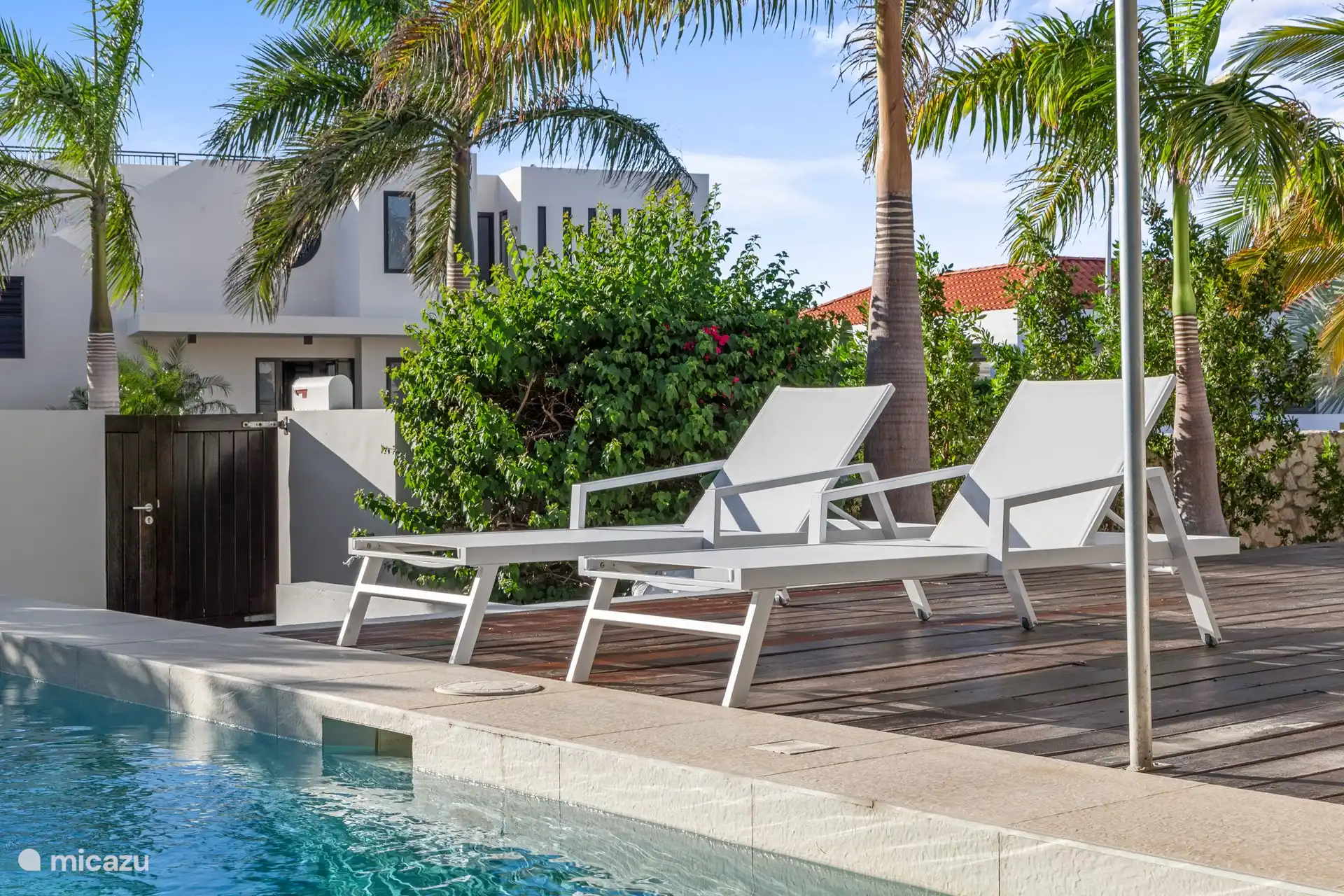 Shaded seating around the pool.