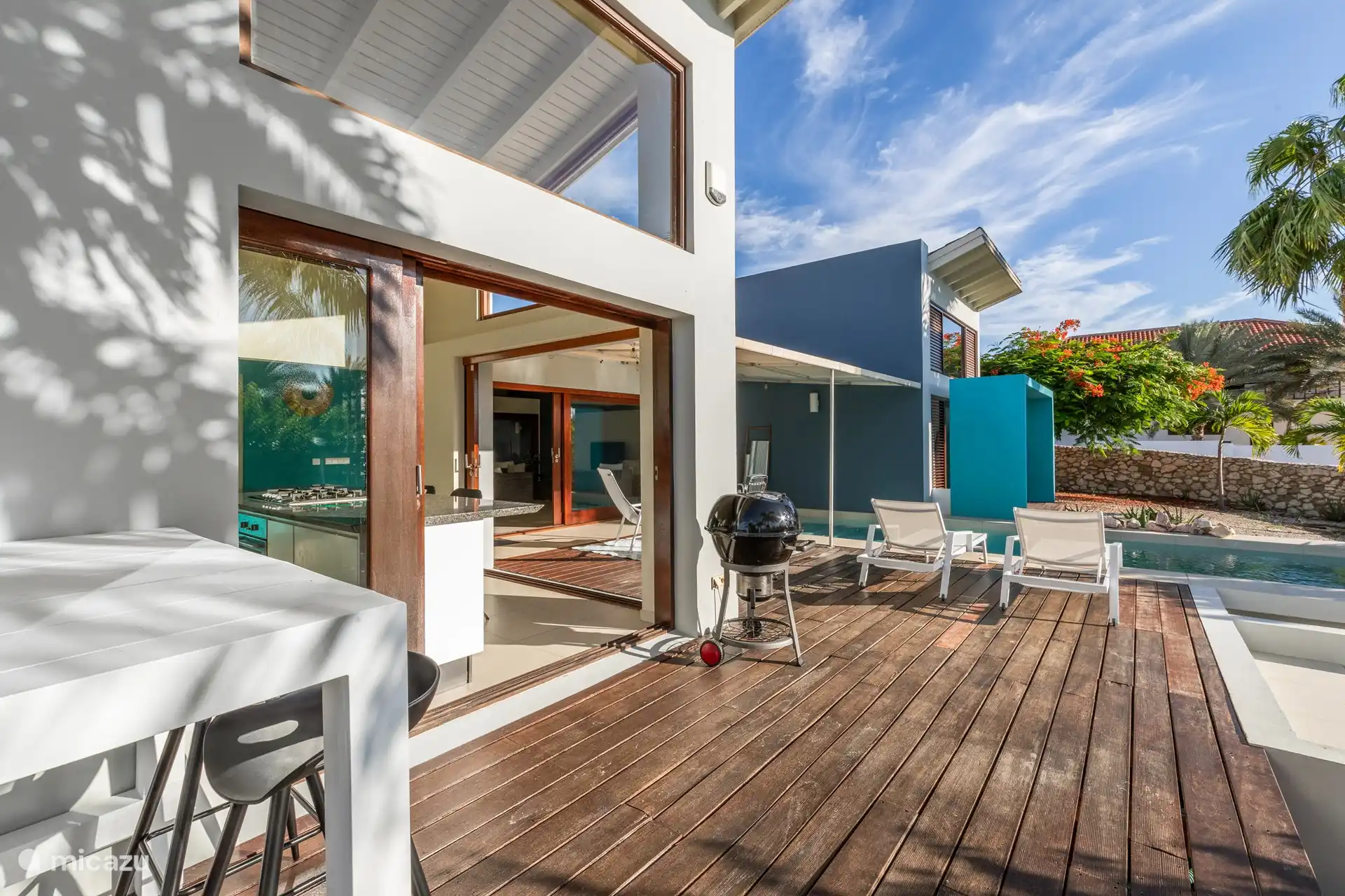 Pool deck, front villa by the kitchen. 