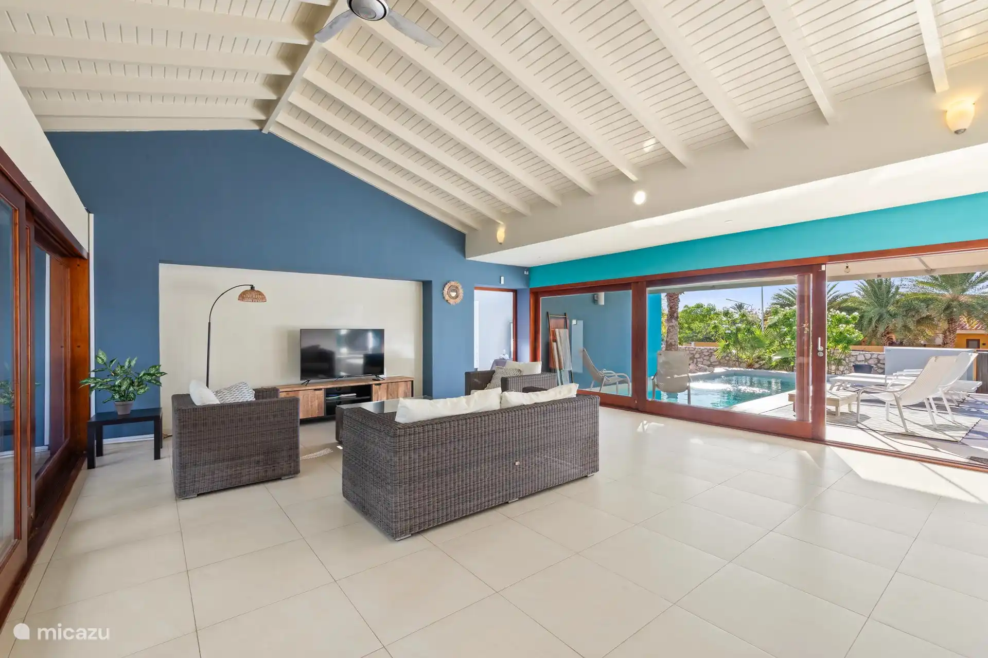 Living room with a view of the pool.