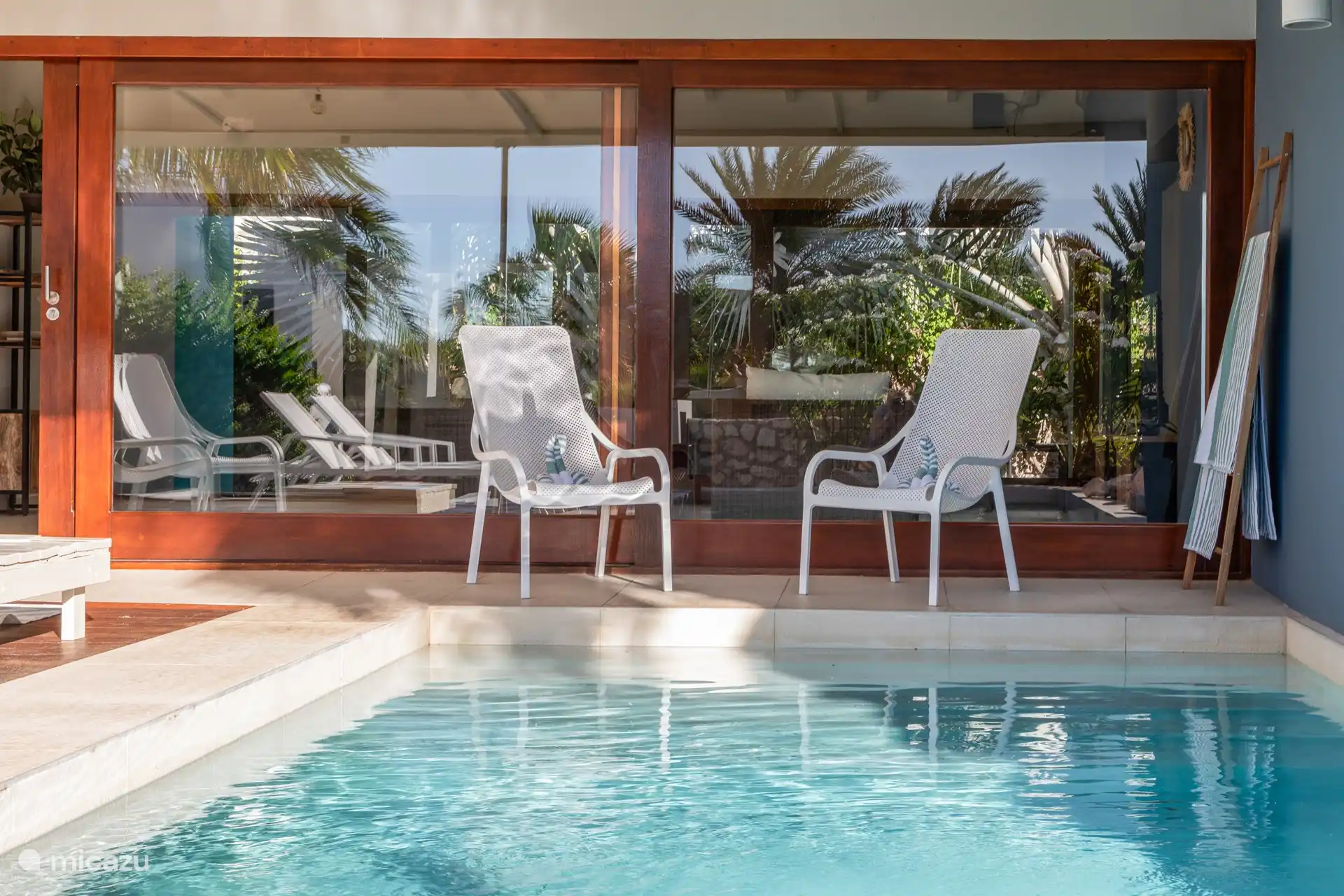 Shaded seating around the pool.