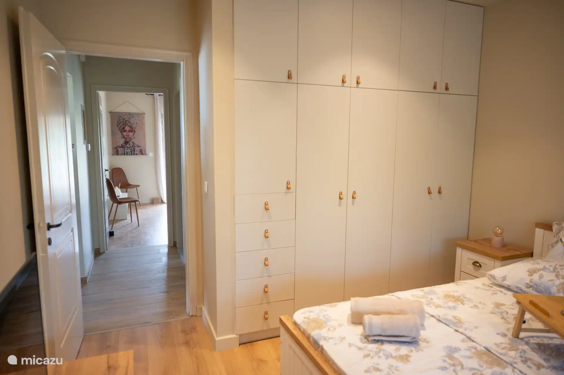 1st floor bedroom and corridor leading to the second bedroom