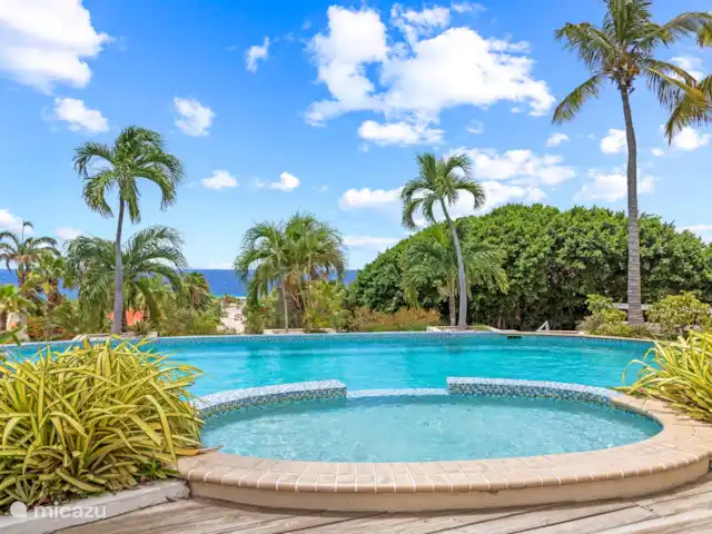 Royal Beach House, Royal Palm resort huren in Curaçao, Curacao-Midden, Piscadera - villa Gezamenlijk zwembad op het Royal Palm resort