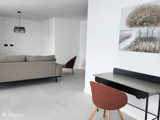 villa en España, Costa Blanca, Rojales  – Casa Sabine Acogedora sala de estar con un cómodo sofá y sillón.