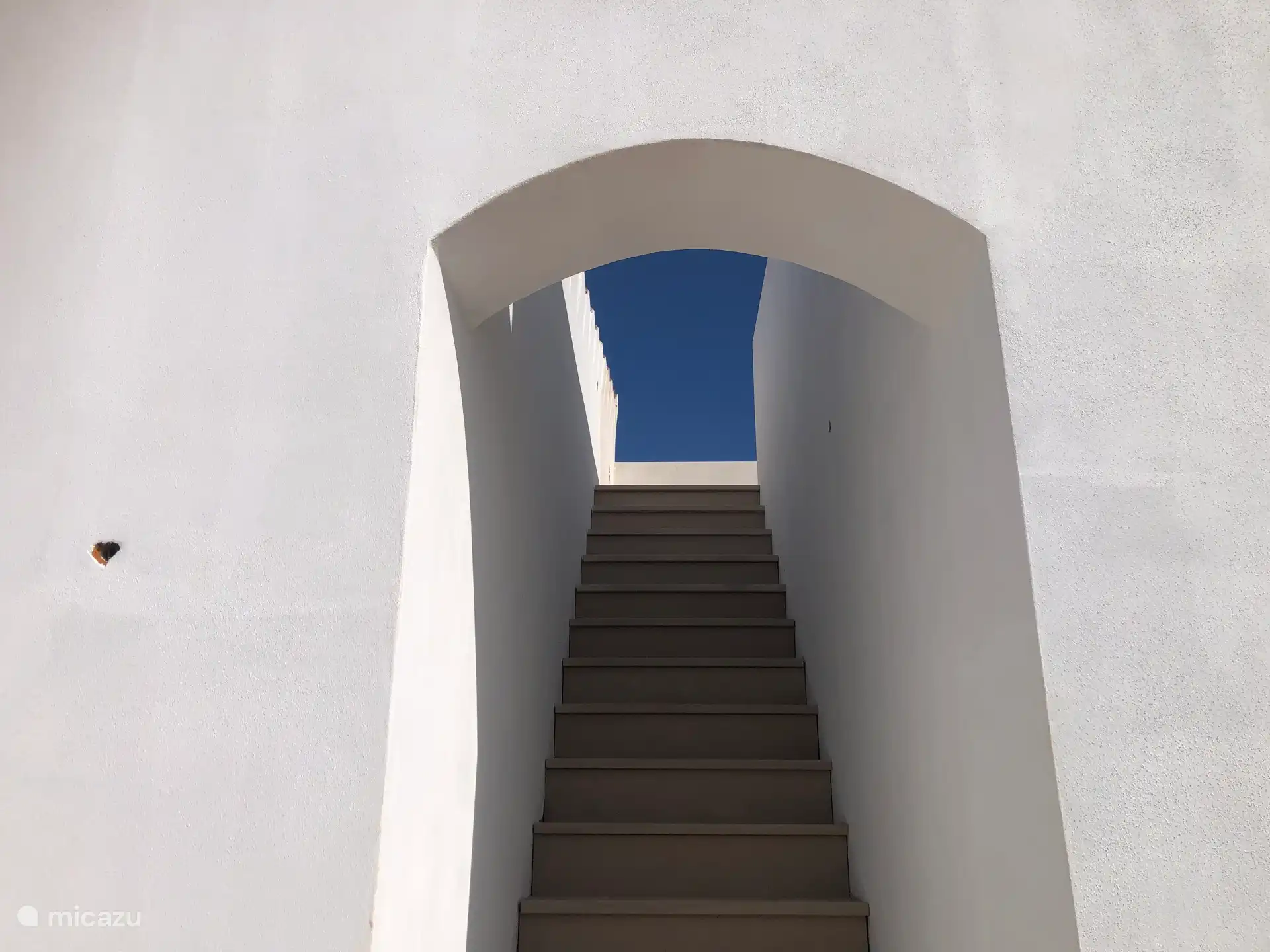 Escaleras hacia la terraza de la azotea