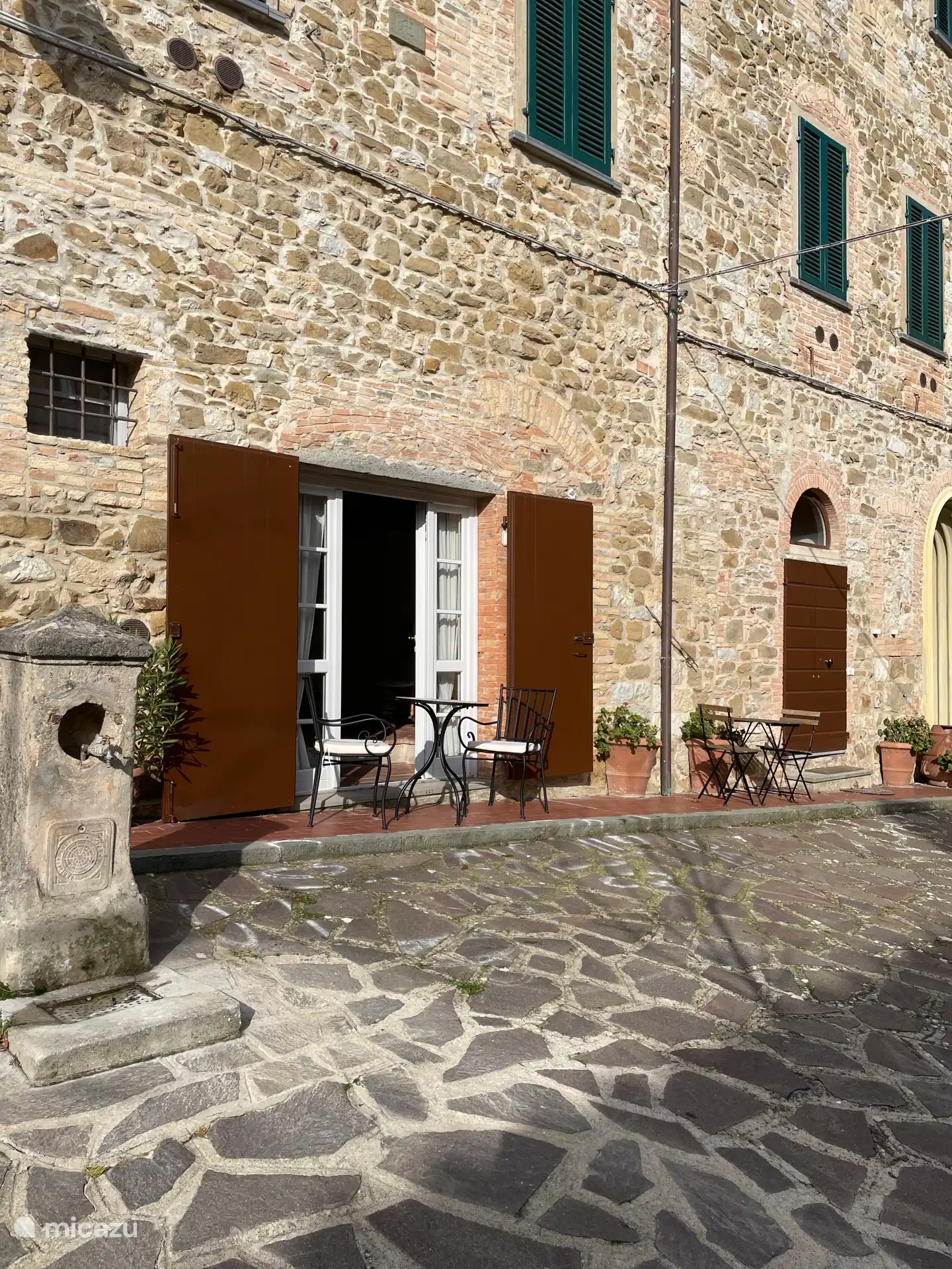 Je eigen terrasje aan het plein