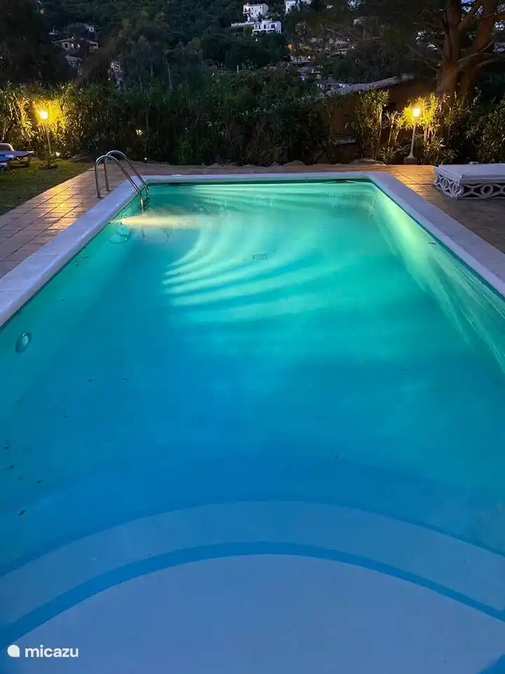 Floodlit swimming pool