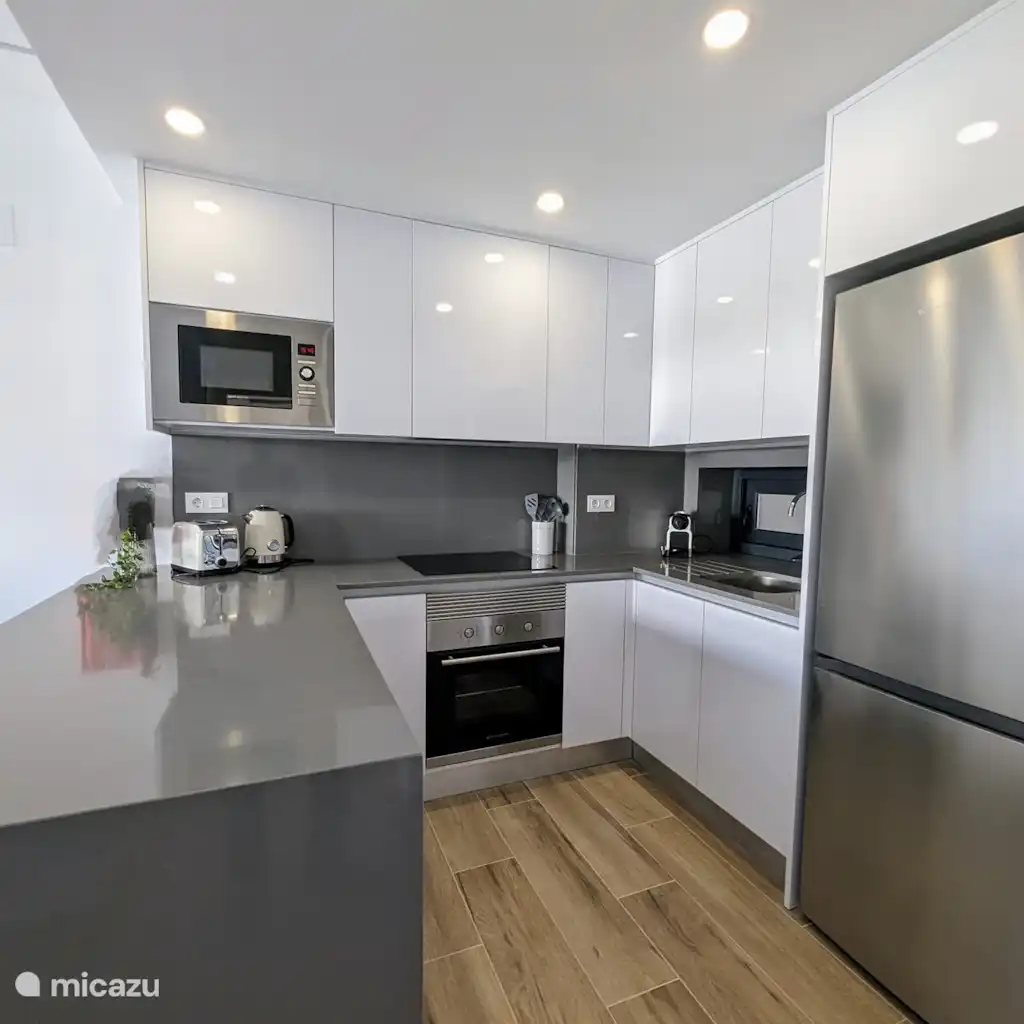 Luxe appartement met zwembadzicht
