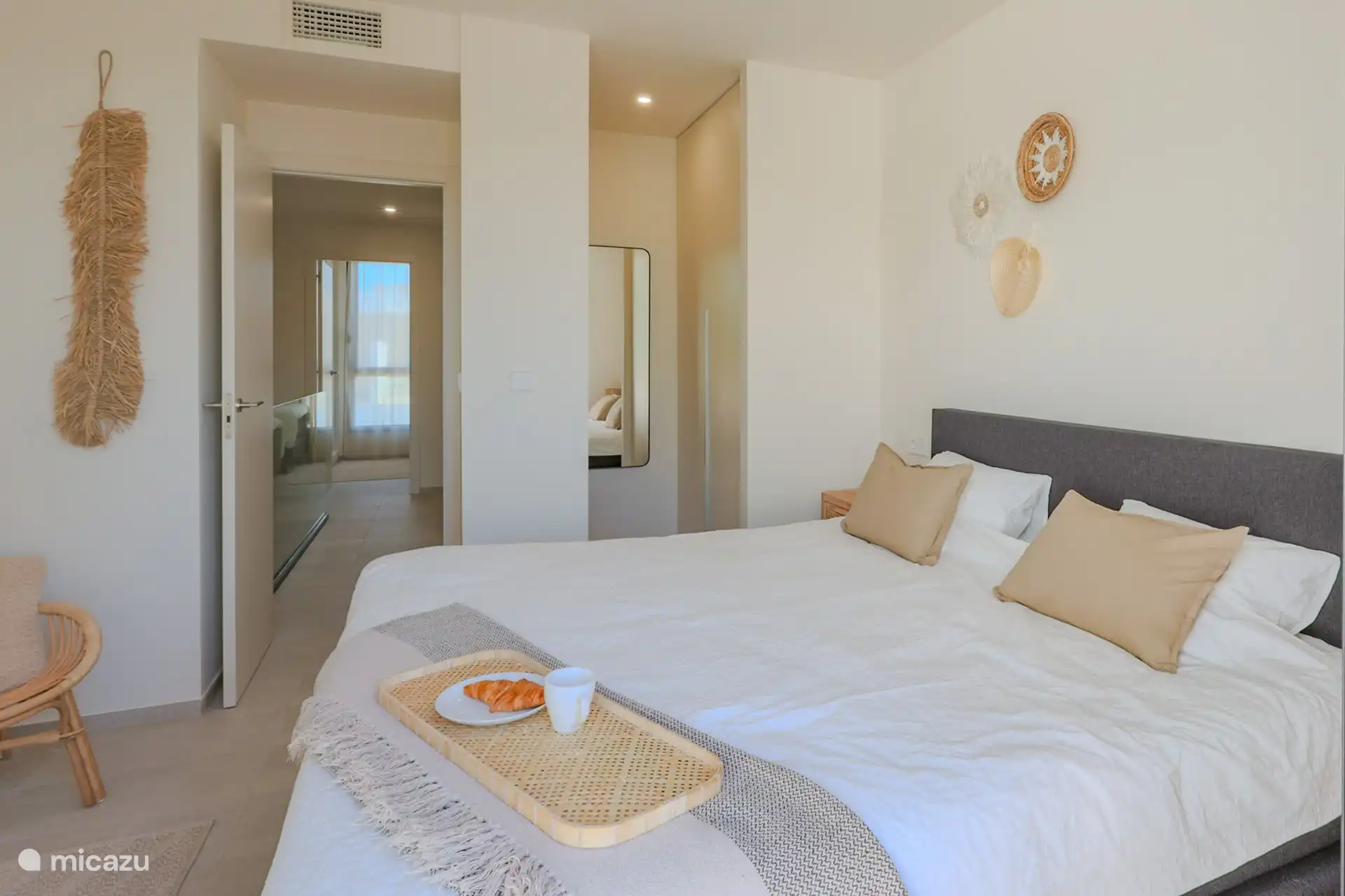 Bedroom with a view of the hallway