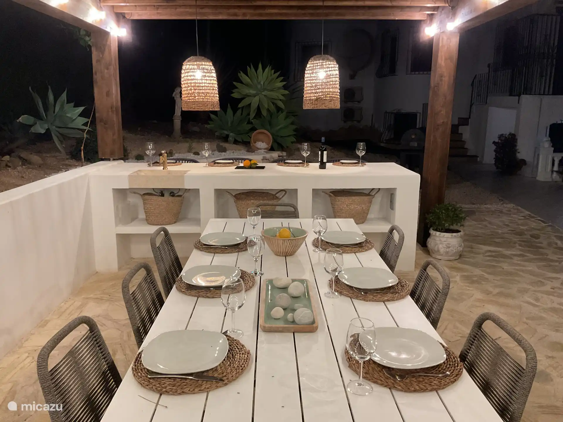 Cozy dining under the shaded pergola