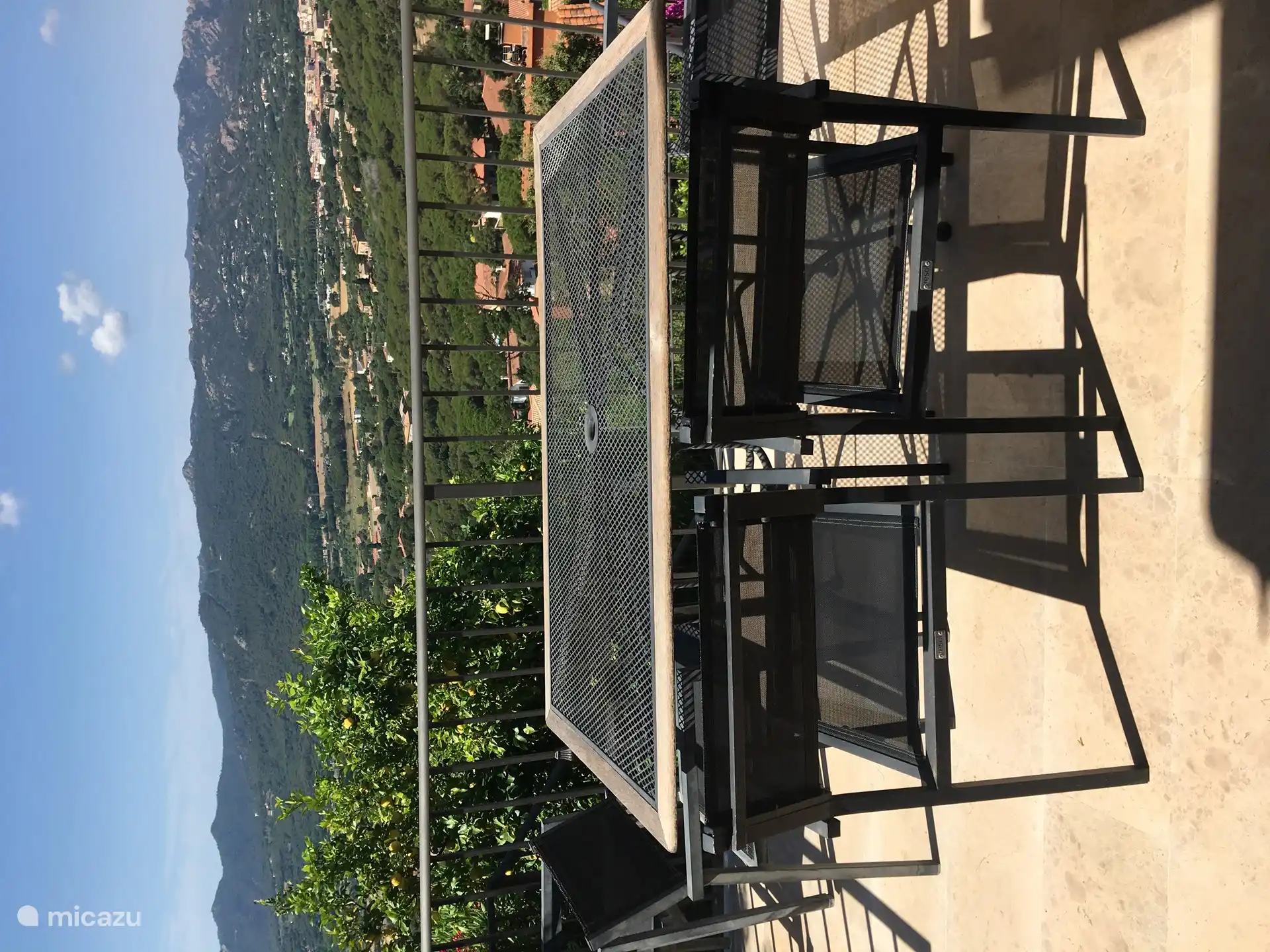 This is the terrace adjacent to the kitchen with an awning for when the sun gets too bright