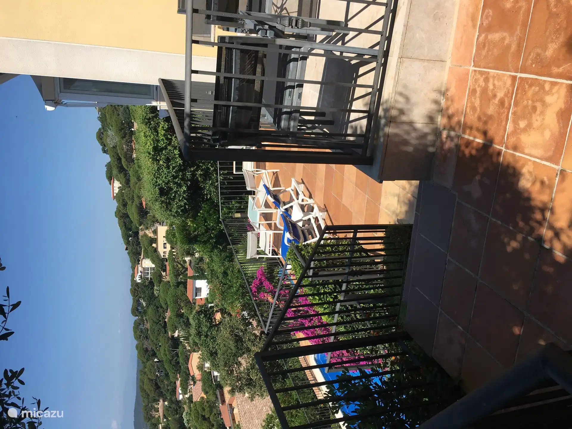 Side terrace next to the kitchen where the BBQ is also located