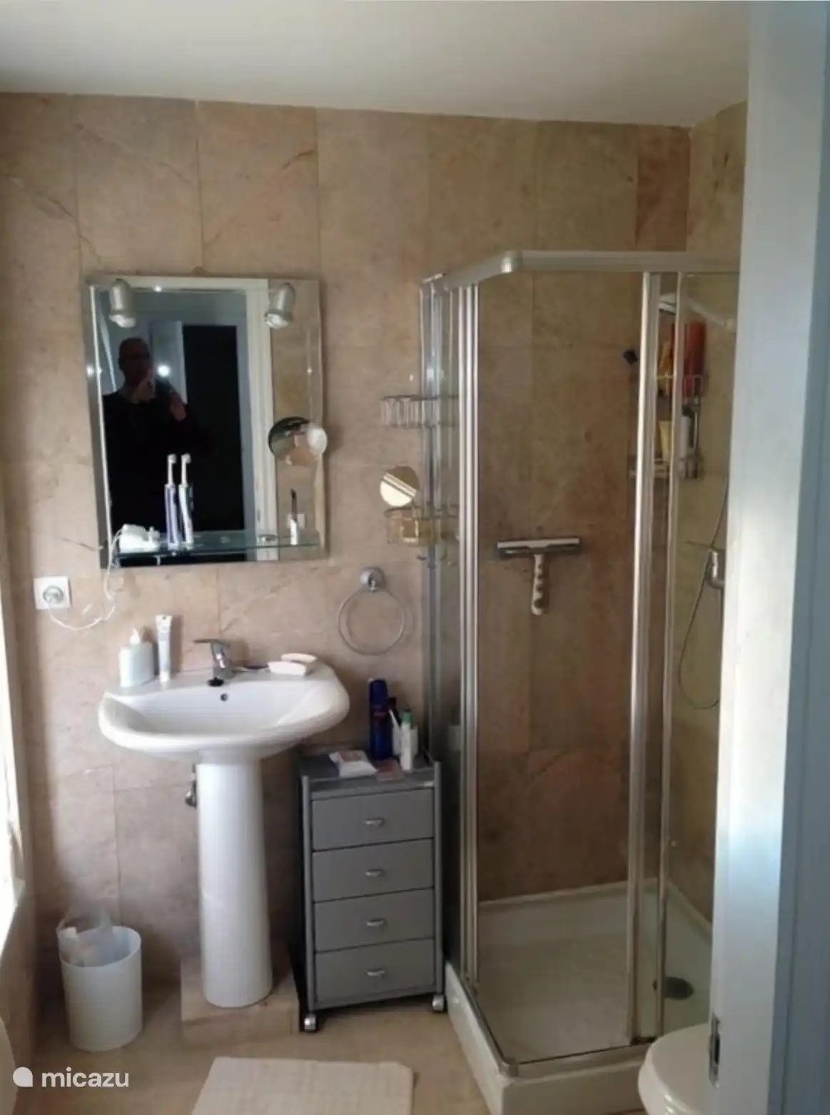 Bathroom of the master bedroom with shower and bathtub
