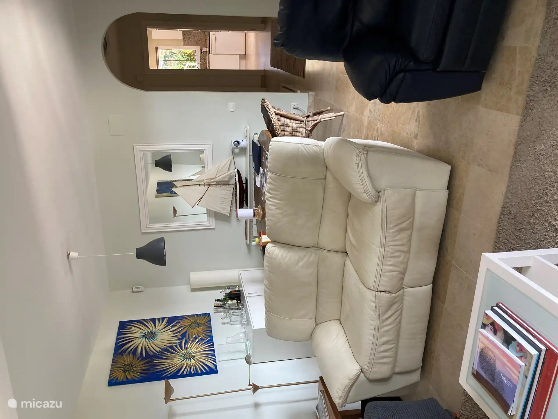 Sitting room with another dining table and hallway to the 3rd bedroom, toilet and kitchen