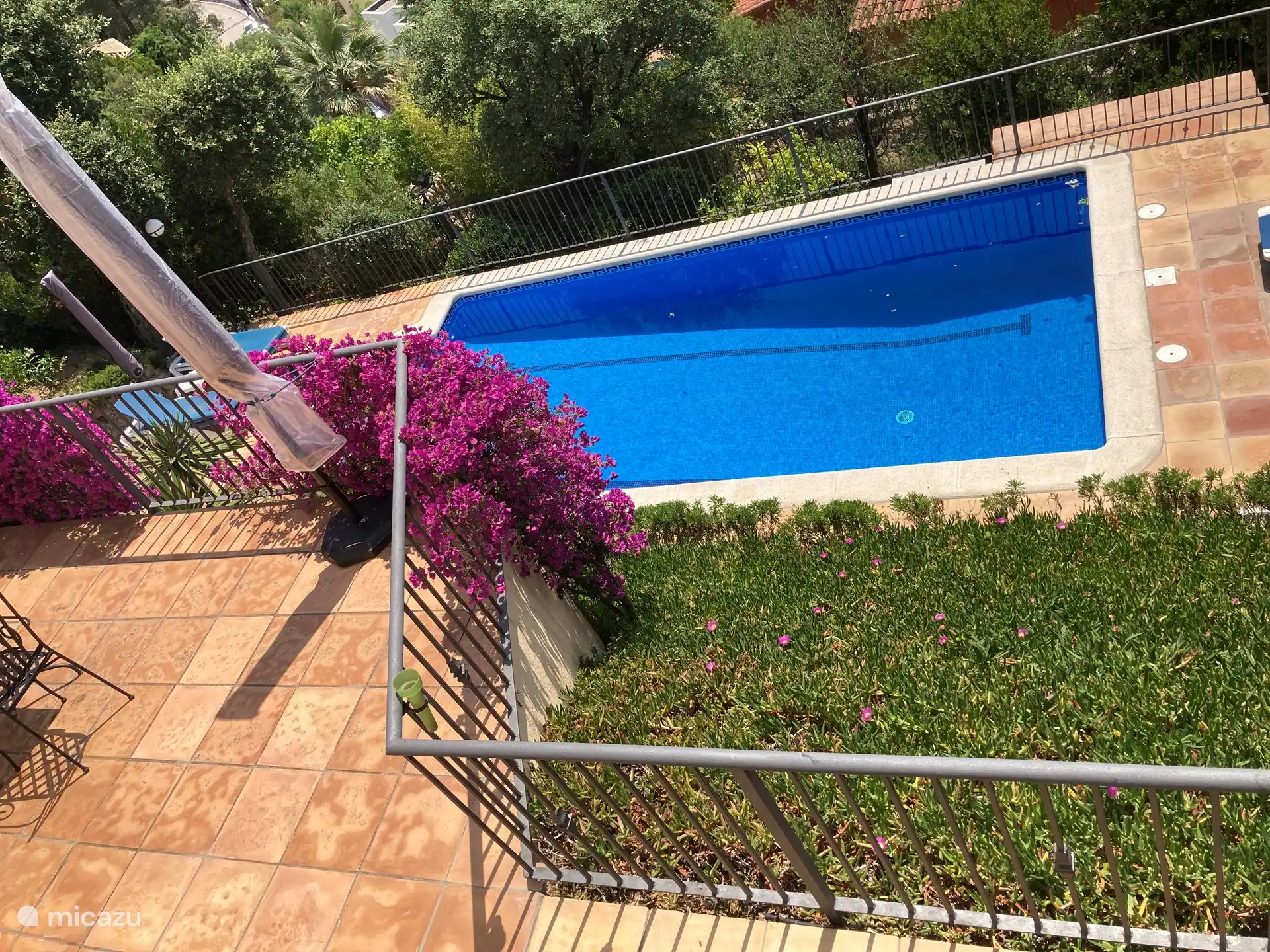 The large swimming pool is filled with saltwater which is better for the skin