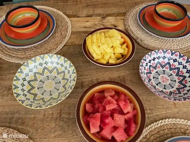 Dining table with crockery. 