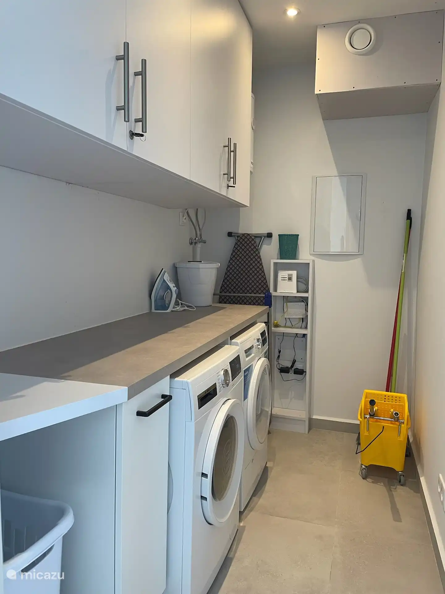 Laundry room with washing machine and dryer. 