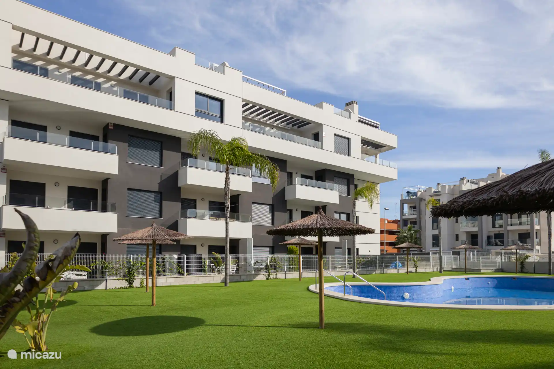 Communal swimming pool with children's pool centrally located on the complex.