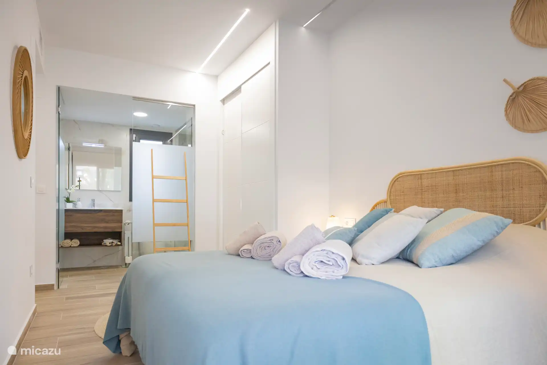 Bedroom 2 with double bed and bed linen. Spacious wardrobe and ensuite bathroom.