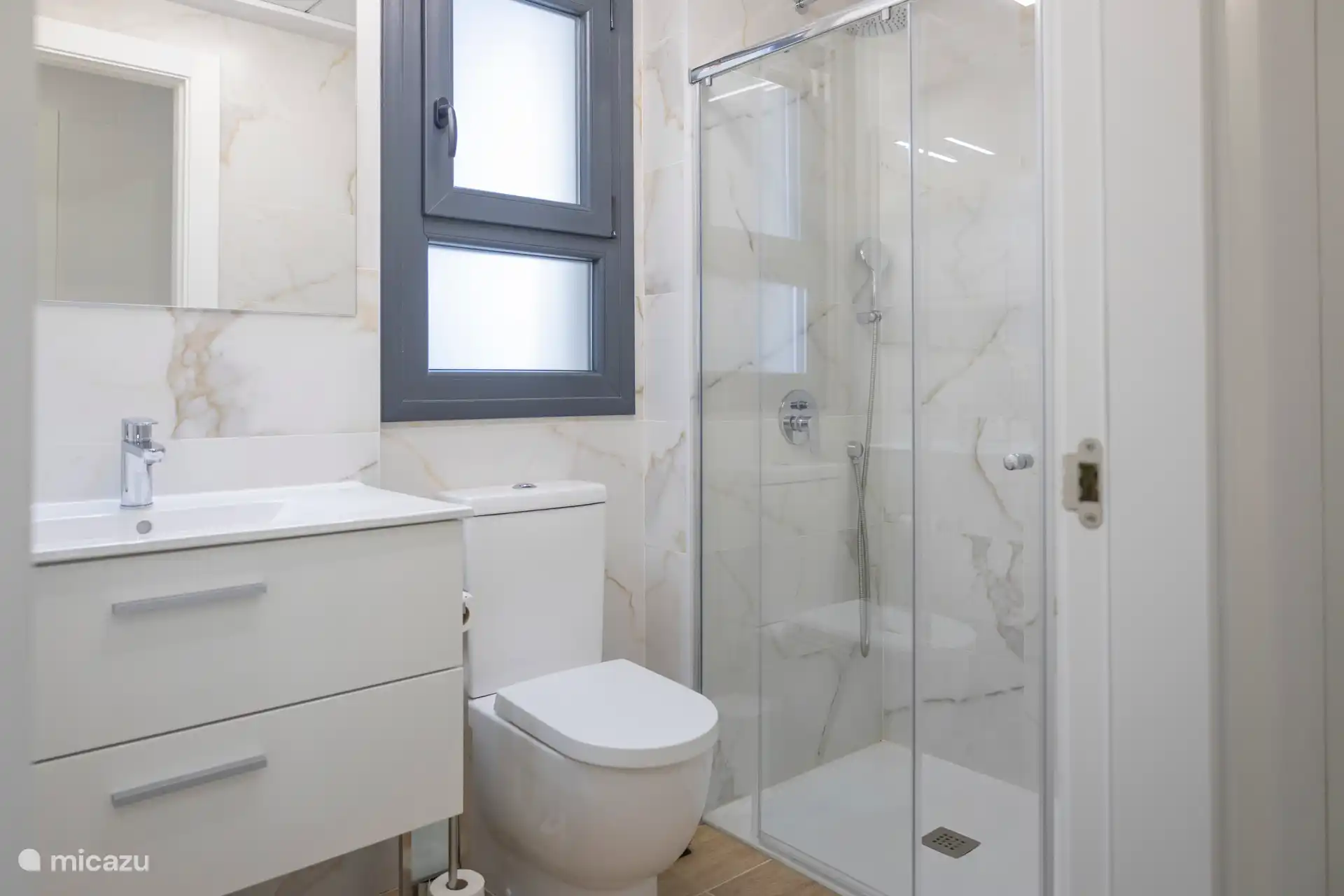 Bathroom 1 with bath linen.