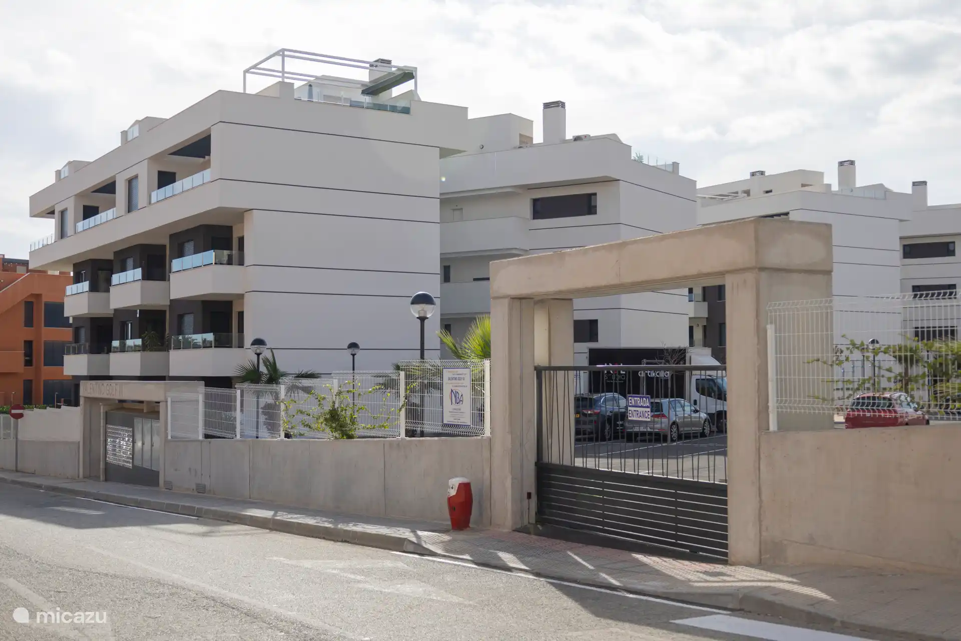 Electric entrance gate to the complex.