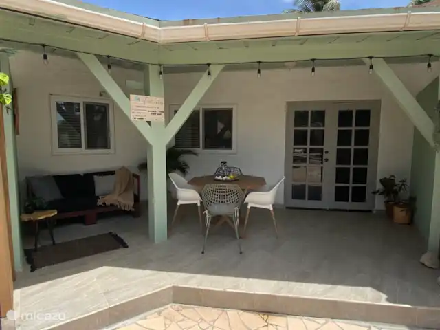 Ruim familieverblijf op Aruba huren in Aruba, Noord, Noord - appartement lekker relaxen op de porch