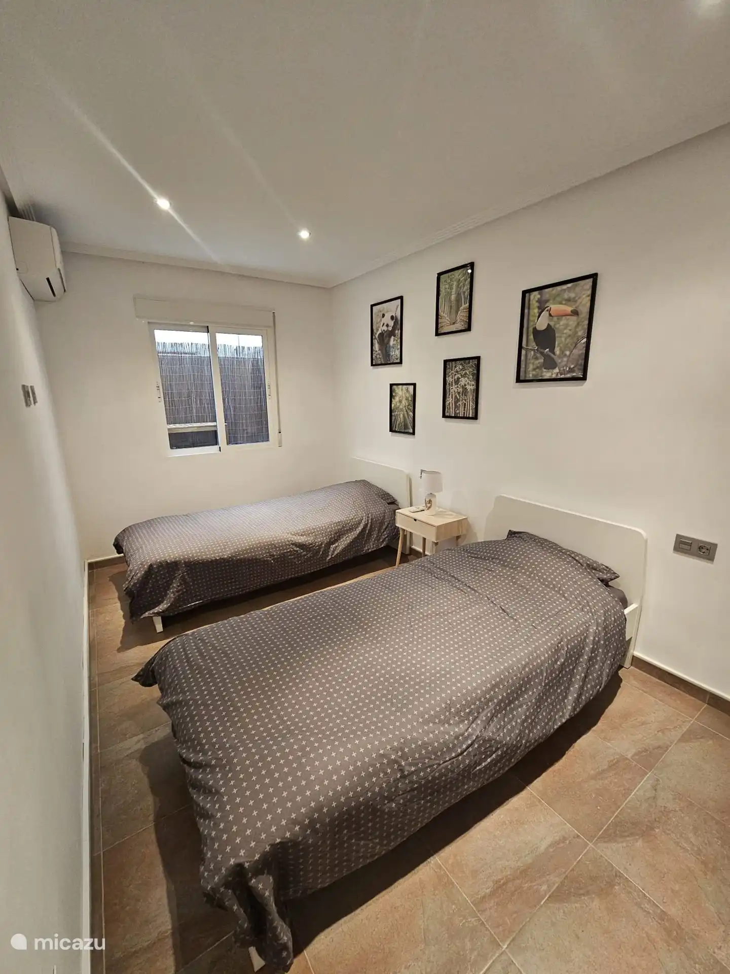 Bedroom with 2 single beds and spacious closet