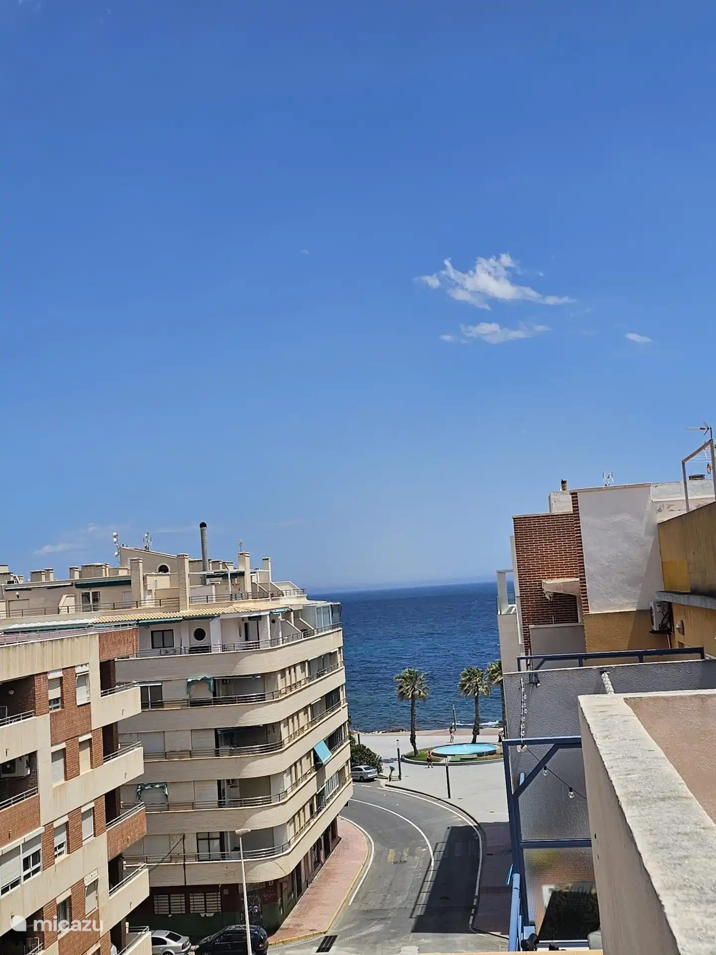 Large communal roof terrace with sea views