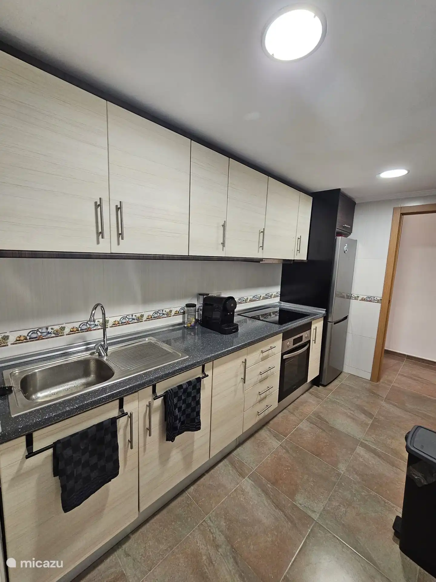 Kitchen with new appliances and utensils