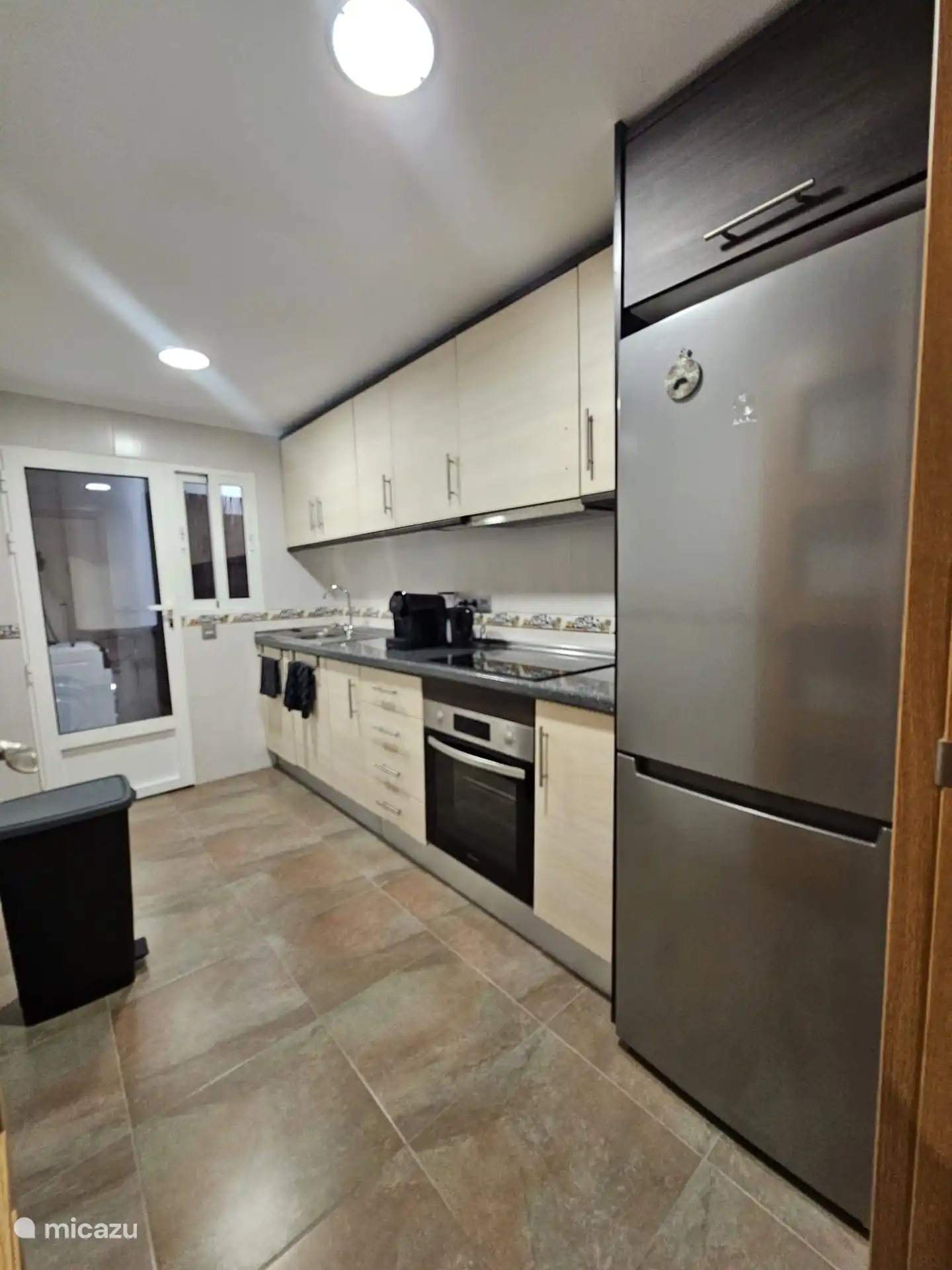 Kitchen with new appliances and utensils 