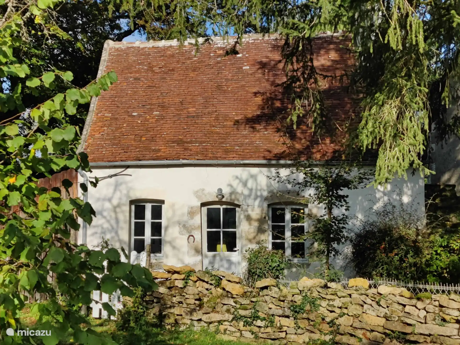 Hidden in the autumn greenery