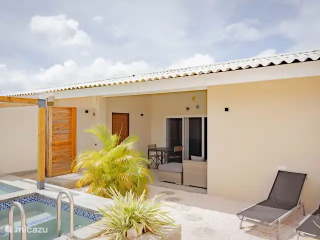 Location de Vacances Curaçao, Banda Abou (ouest), Hofi Abou, maison de vacances - Bunitesa di bida - Kas Chogogo Jardin et véranda